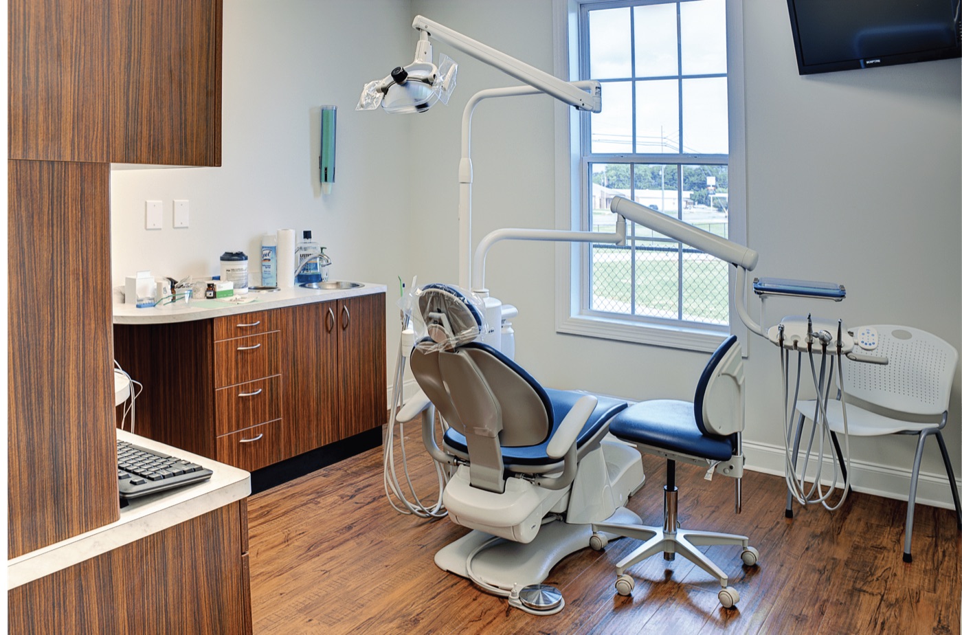 A treatment room at our Nashville office with a dental chair beside a window